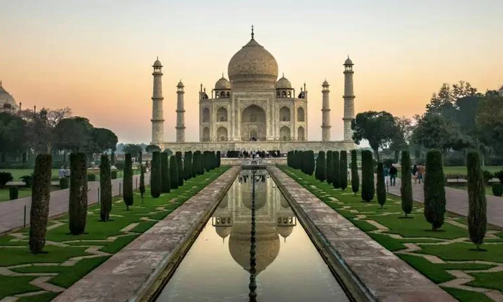 Taj Mahal sunrise view - iconic marble monument of eternal love in Agra Uttar Pradesh tour package