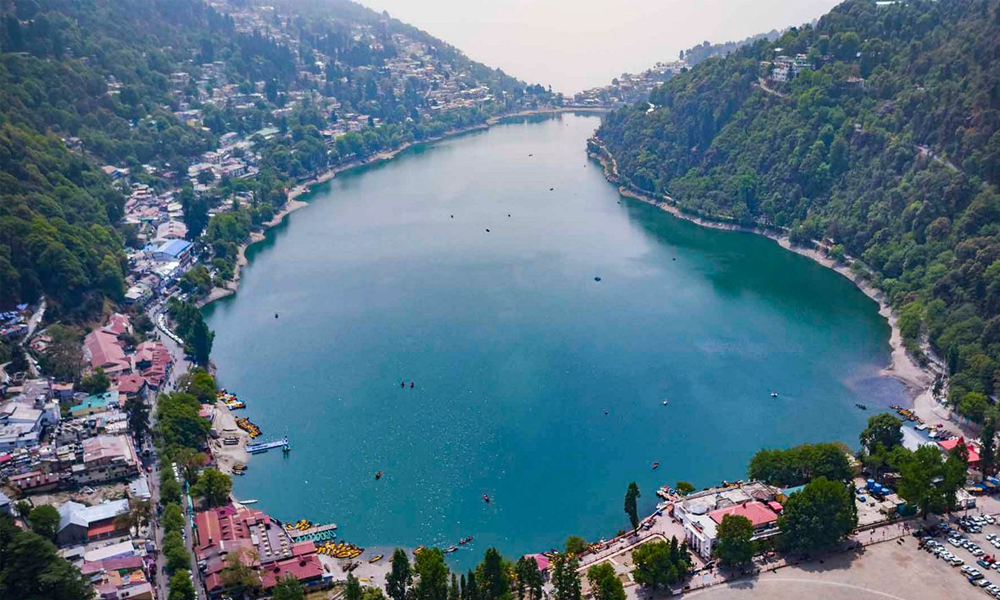 Nainital Lake with pine forest hills